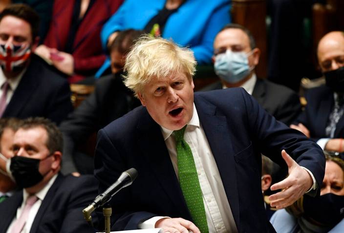 約翰遜指英國將解除防疫限制。AP圖片
