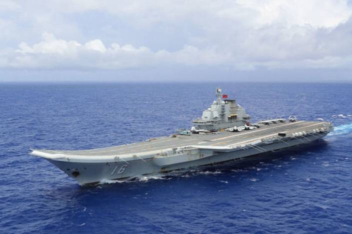 中國首艘航母遼寧艦正式入列十周年。