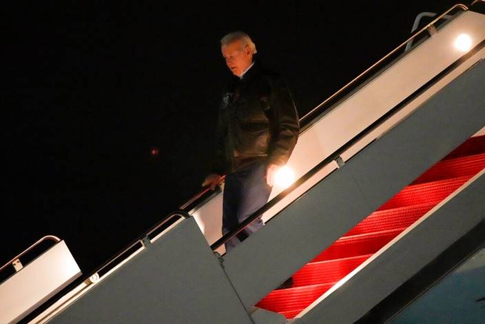 Biden rushed back to the United States.  AP images