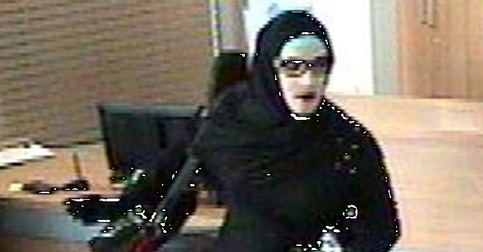 Austrian police hunt cross-dressing, hijab-clad bank robber