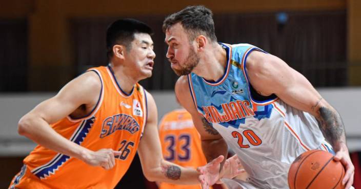 Shanghai Sharks competes with Xinjiang Flying Tigers at CBA 33rd round match