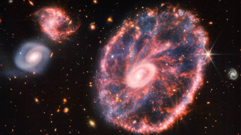 Webb telescope captures wheel galaxy spectacle